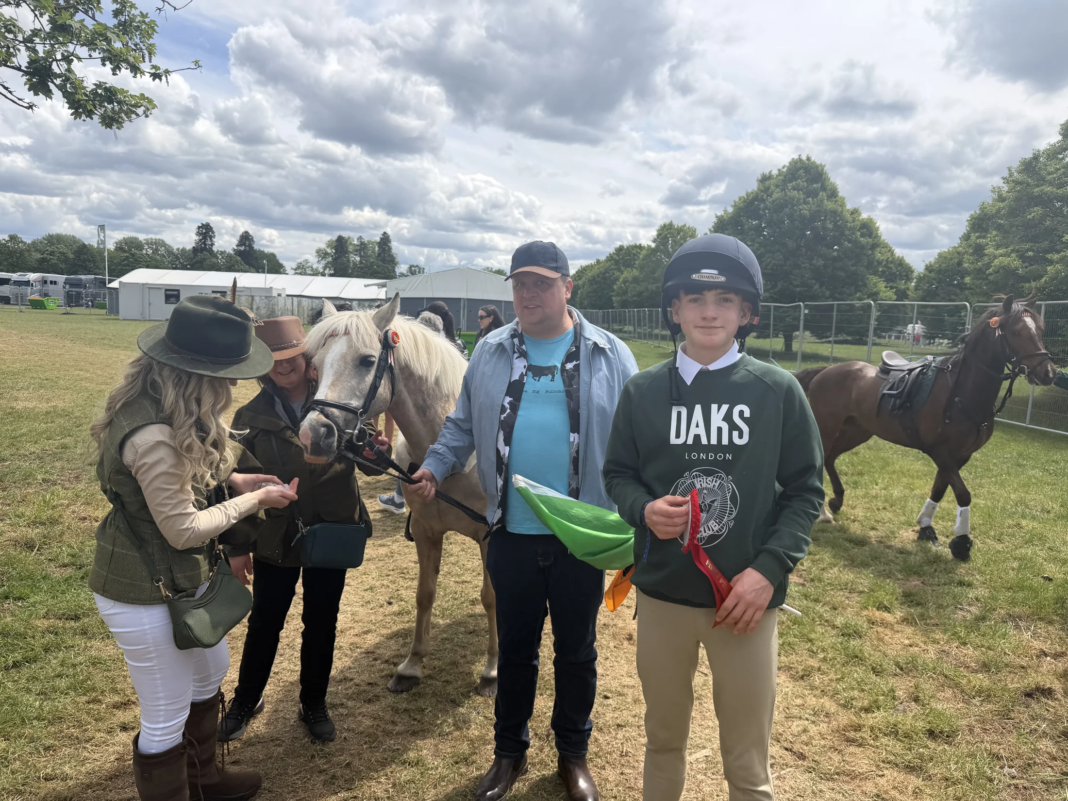 The team gathered in the paddock area at Royal Windsor.
